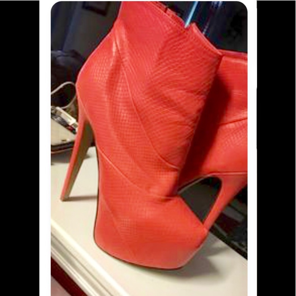 Platform snake ankle boots